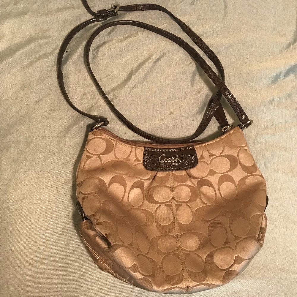 Small brown authentic coach cross body style bag